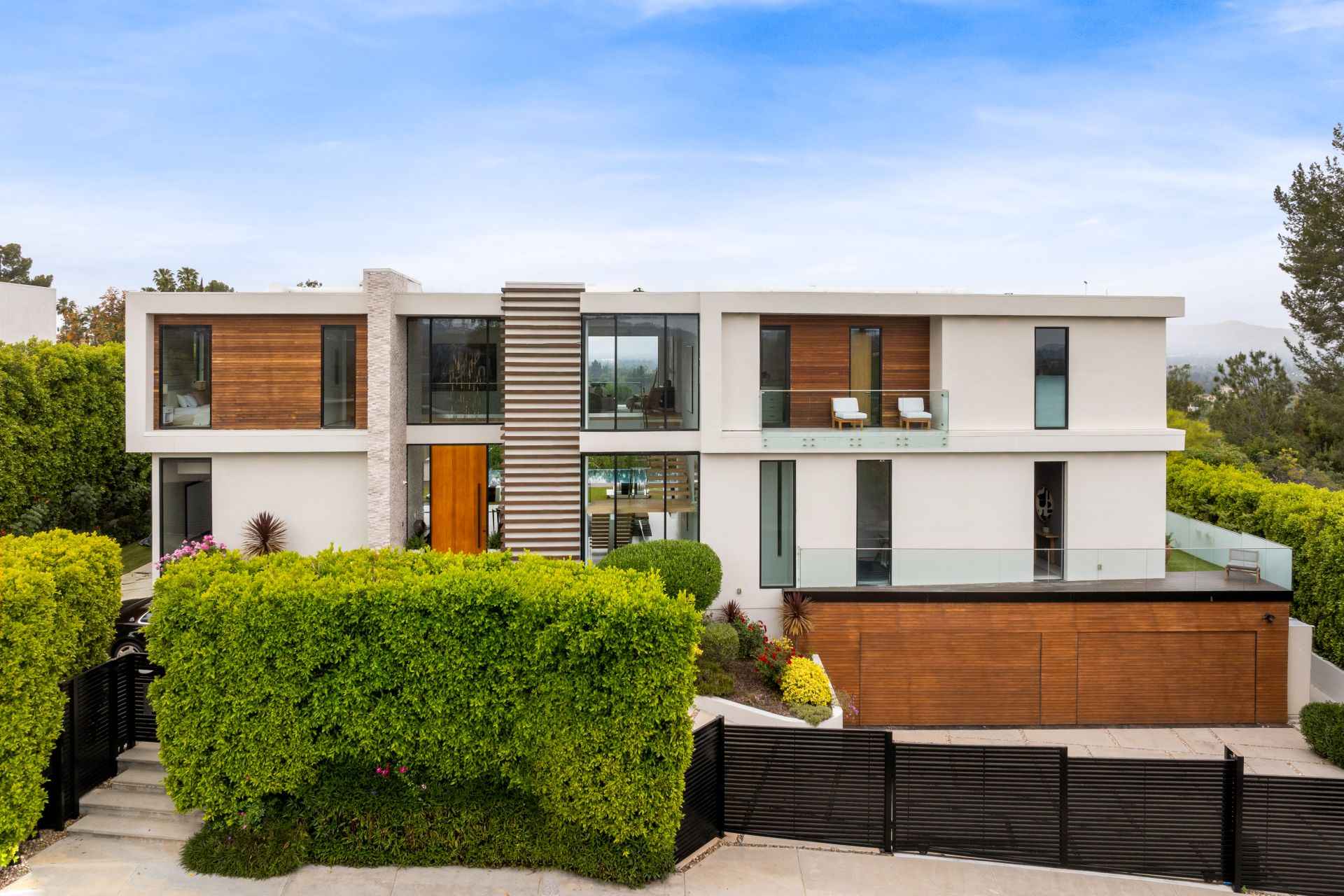 spacious-modern-house-perched-on-a-verdant-hilltop-2024-06-18-18-28-29-utc_11zon.jpg